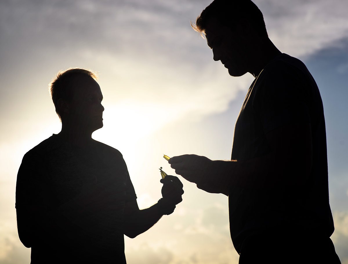 Two farmer sihloettes